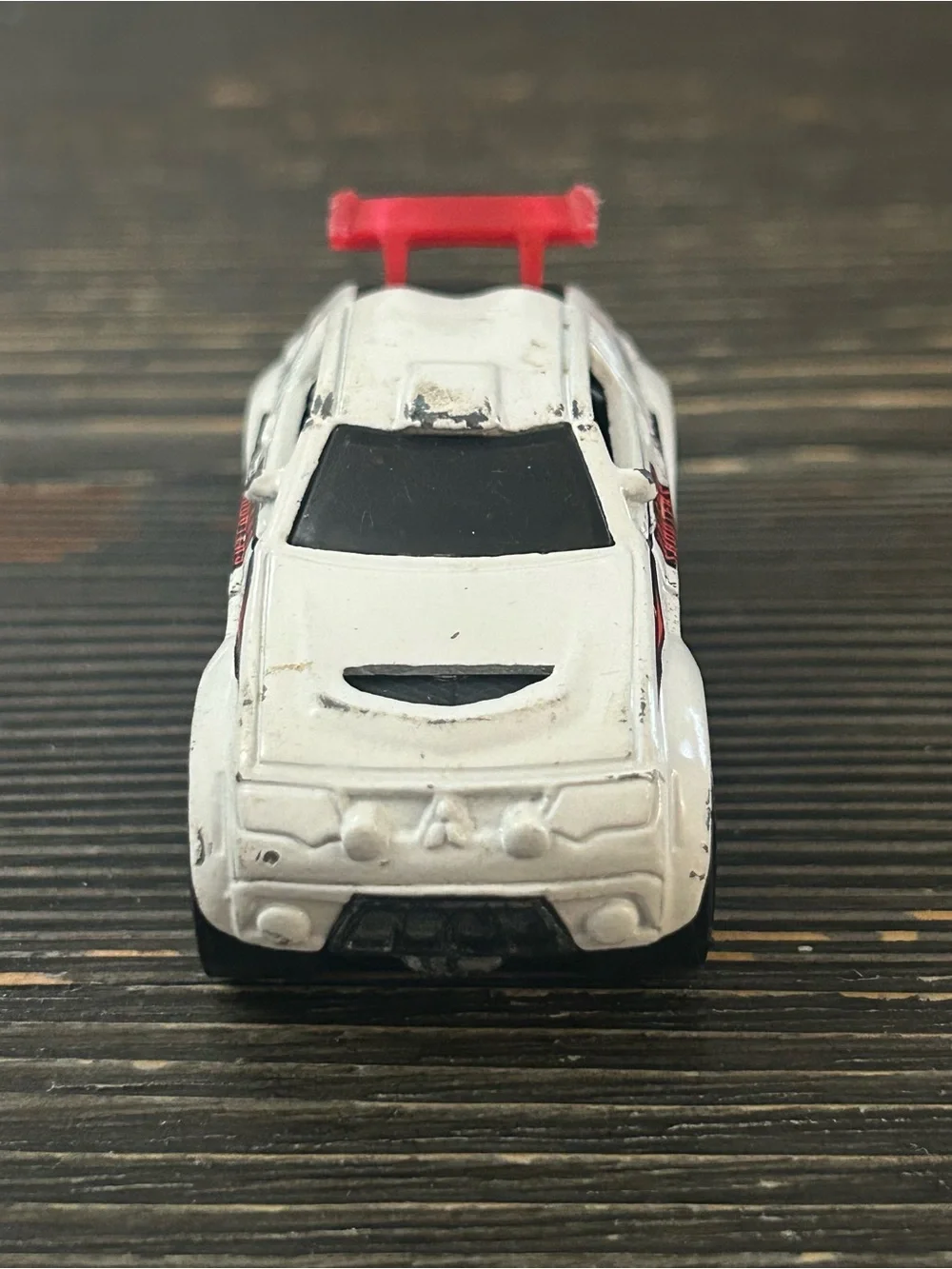 Volcano Shooters 202 White Toy Race Car with Red Wheels